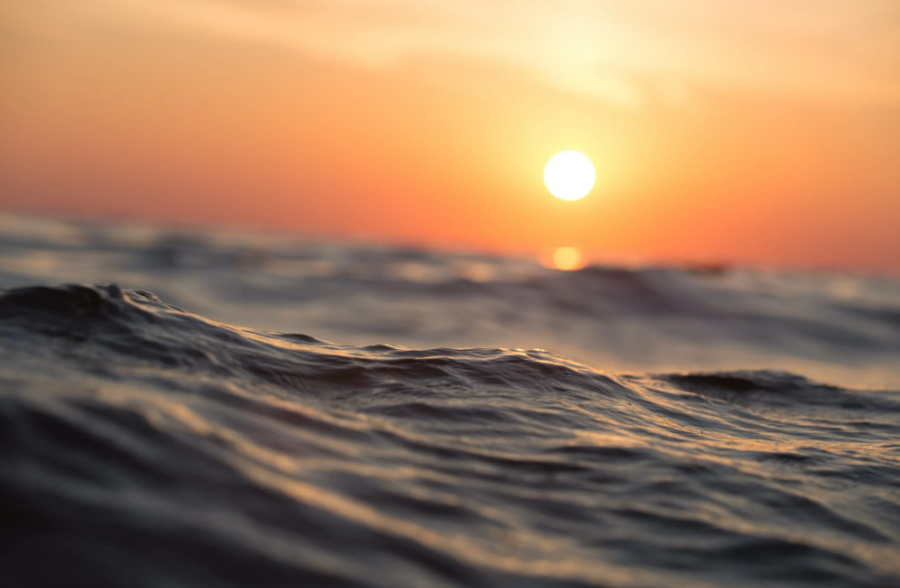 Zee met zonsondergang